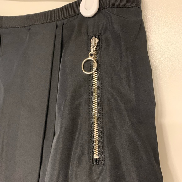 Pink Tartan black a-line skirt w/silver zipper pockets, gold/silver back zipper. - Picture 3 of 5